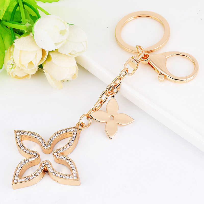 

Creative Clover Keychain Gold Key Holder Metal Key Chain Fashion Keyring Charm Bag Auto Pendant Gift Wholesale Price G1019