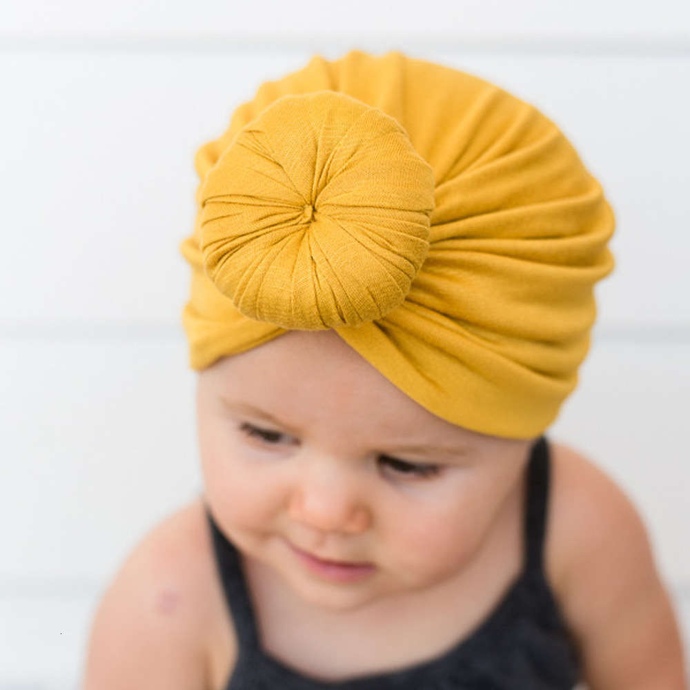 

Children's doughnut Indian HAT baby hood solid knot ins, Yellow