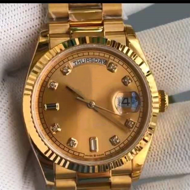 

Classic gold wristwatch, week display, Slivery;brown