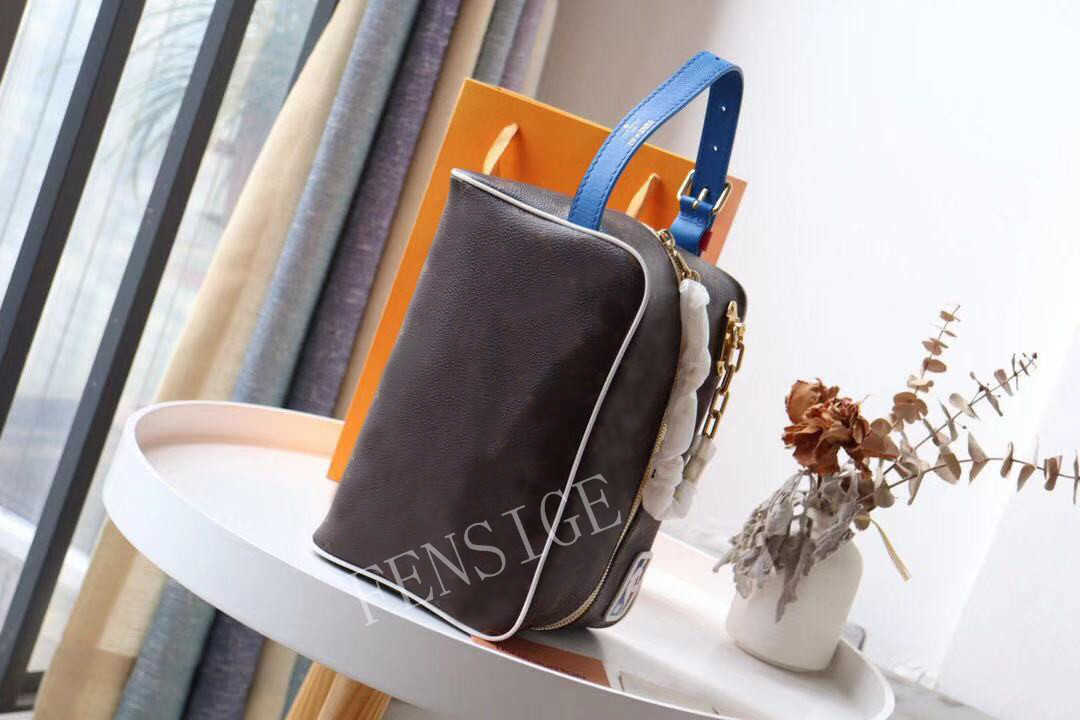 

Designer Bags makeup bag mens womens Toiletry 2021 new fashion clutch bag letter and flower printed handbag M85149 Wallets, Brown