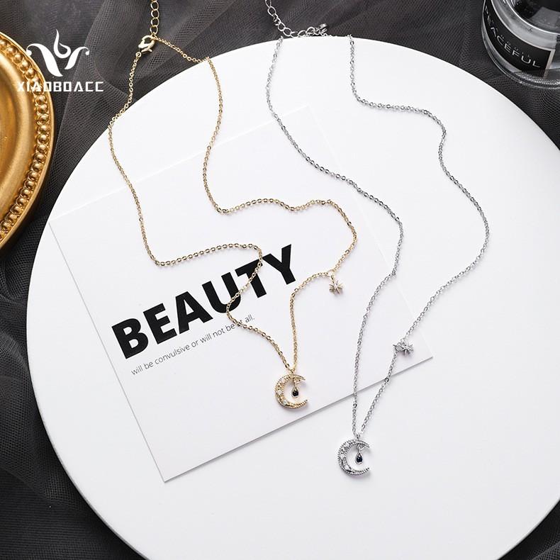 

Chains XIAOBOACC Women's Jewelry Korean Fashion Micro Inlay Zircon Drop Moon Pendant Necklace, Silver