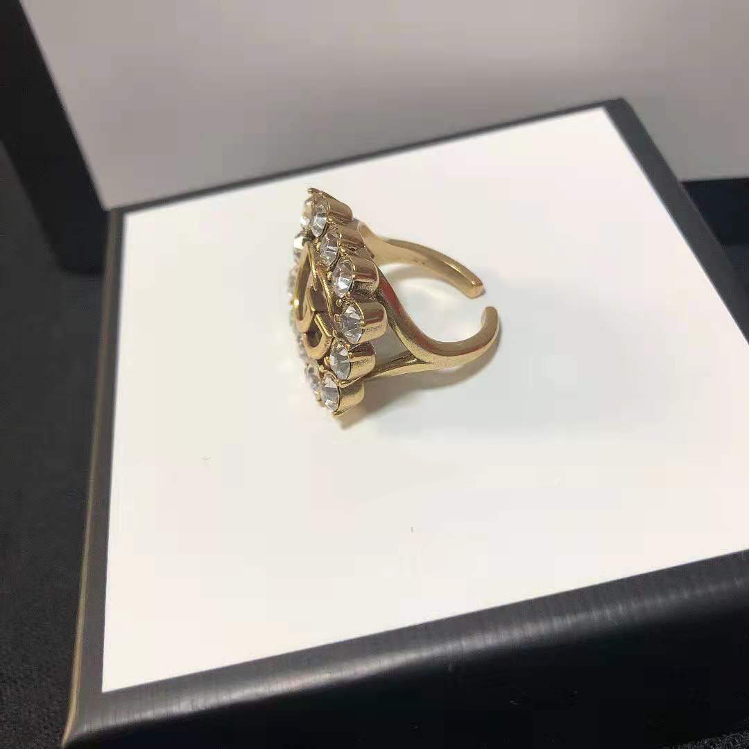 

70% off G net red simple gold old inlaid zircon letter women's hollow out ring