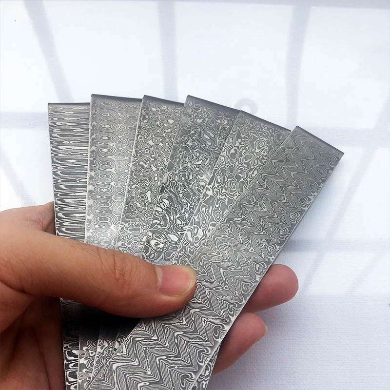 

1piece VG10 Sandwich Damascus Stee for DIY Exquisite Knife Making Fat Ground Knife Bade Has Been Heat Treatment 100x30x2.5mm