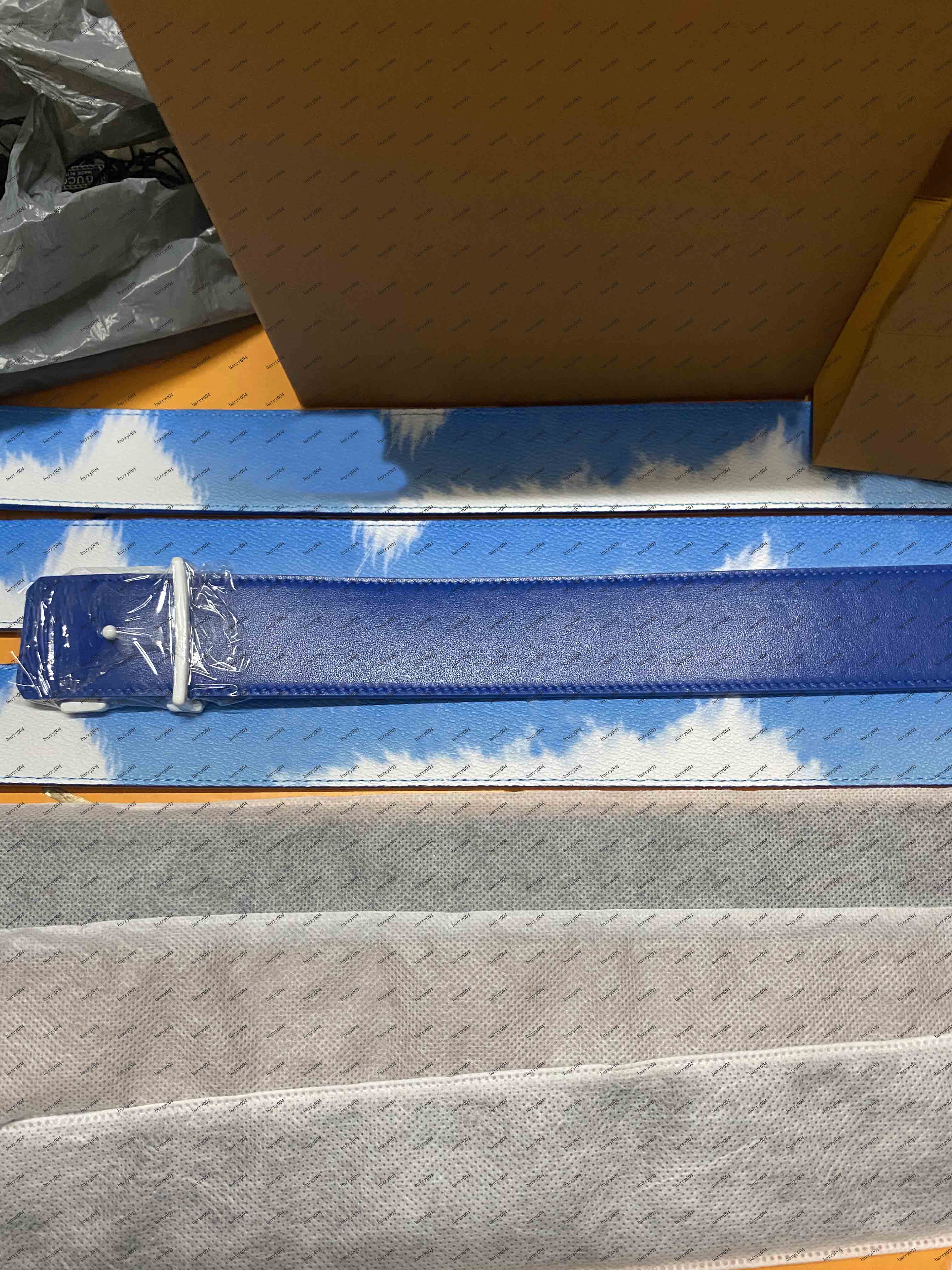 

Fashionable unisex belt w ith blue sky and white cloud pattern, buckle with classic letters, Black and white box
