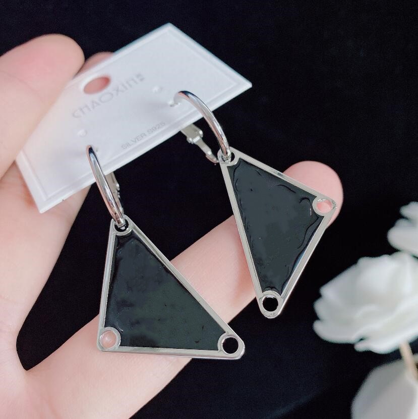 

2021 Korean letter Dangle & Chandelier triangle simple design sense net celebrity big earrings female high quality fast delivery