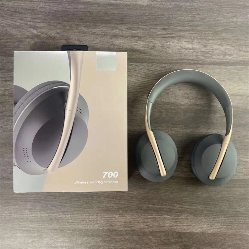 

Dropship 700 Bluetooth Earphones Wilreless Headphone Headset Brand Earphone With Retail Box White Gray Silver Black 4 Colors