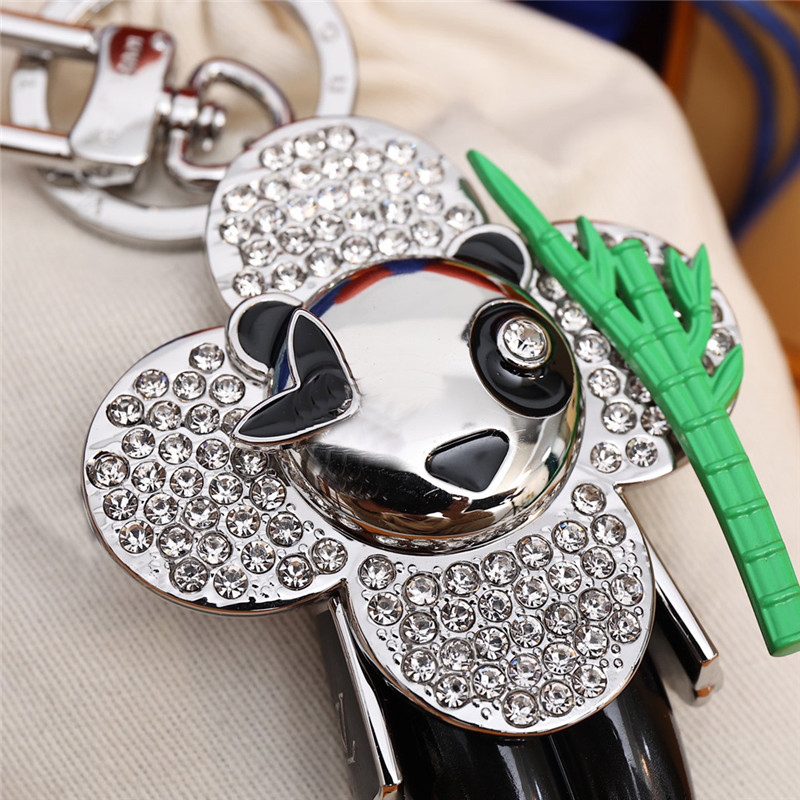 

Luxury Designer Keychain Stylish Sun-flower Doll Pendant Keychains Panda Keys Buckle Mens Womens Bag Key Ornaments High Quality