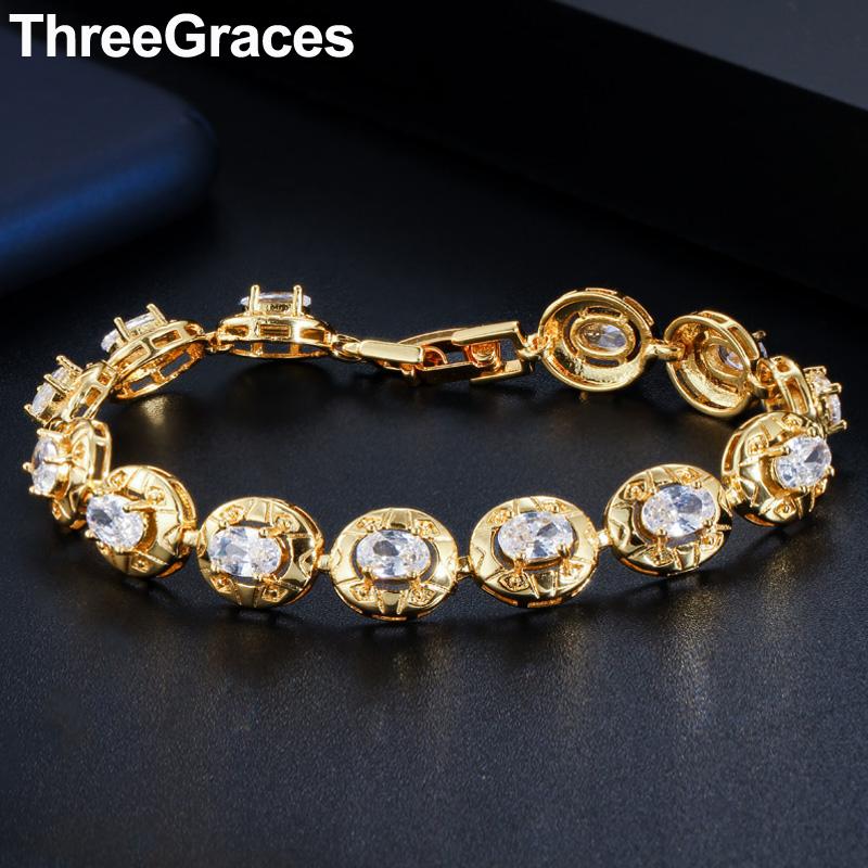 

Charm Bracelets ThreeGraces Fashion Yellow Gold Oval Cubic Zirconia Crystal Wedding Party Bracelet Bangle For Women Jewelry BR127, Golden;silver