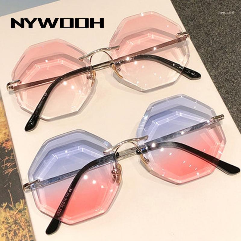 

Sunglasses NYWOOH Rimless Women Luxury Diamond Cutting Lens Round Sun Glasses Ladies Brand Designer Clear Brown Shades UV4001