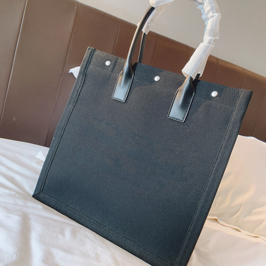 ladies black cross body bolsa