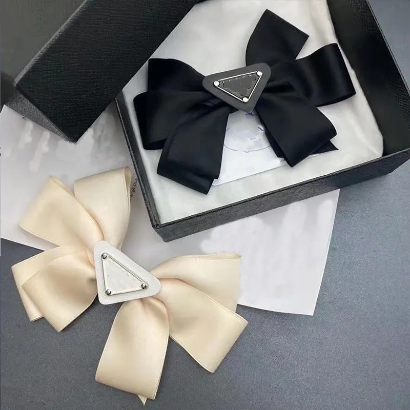 

European American inverted triangle letters Hair Clips & Barrettes fashion age reduction white and black big bow headdress female high quality
