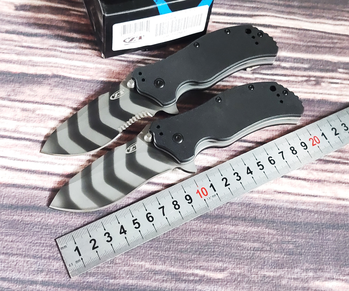 

2020 Zero Tolerance Model 0350TS Auxiliary Fin Knife 3.25" S30V Tiger Pattern Plain Weave Blade, Black G10 Handle Genuine