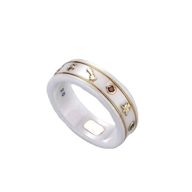 

The ancient family bee star black and white ceramic ring fashion trend double G word men and women lovers rings