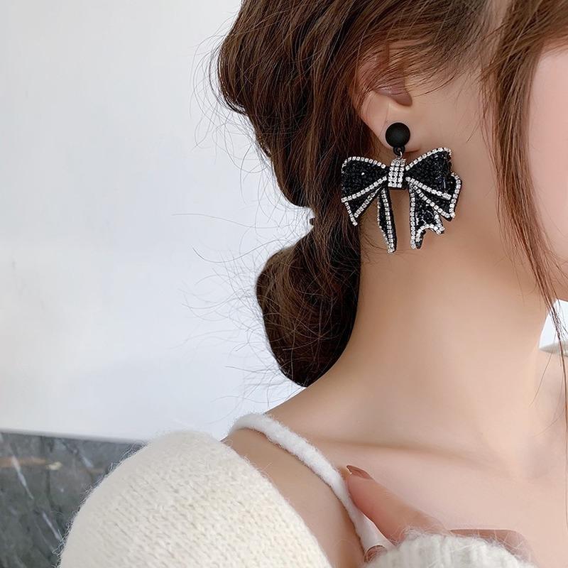 

Stud Temperament Simple Niche Design Earrings Fashion Tassel Wild Black Flash Bow Korean Wholesale, Golden;silver