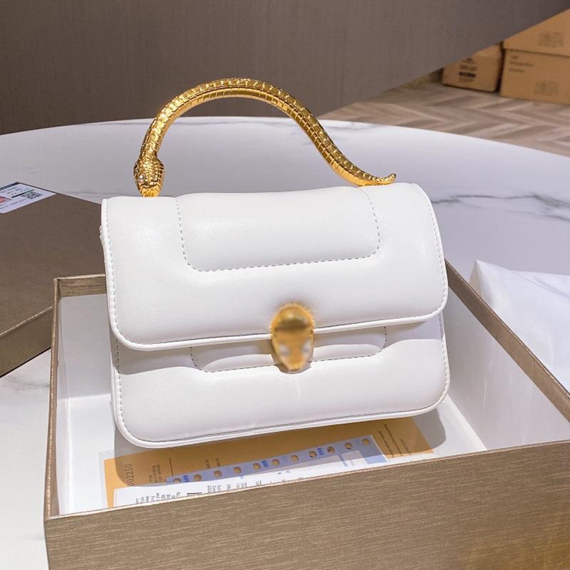 

2021 new Italian brand fashion snake head lock portable dinner bag women's snake-shaped handle leather shoulder messenger hand grip multi-color optional, White