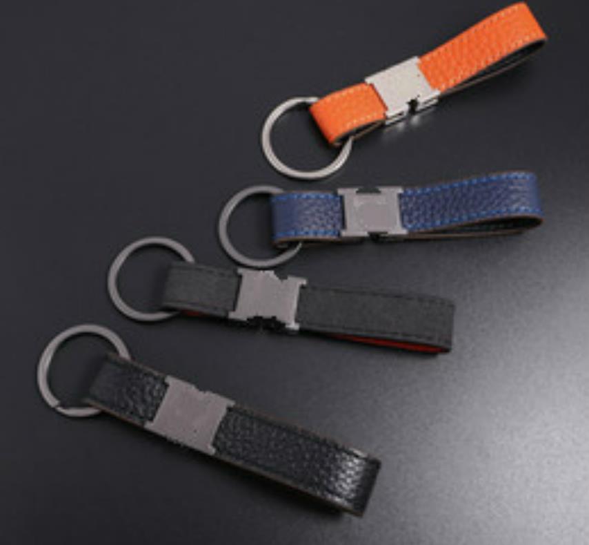 

New 2021 Fashion keychain designer unisex key chain real leather with stainless steel keychain keyring in white gold with black, Silver