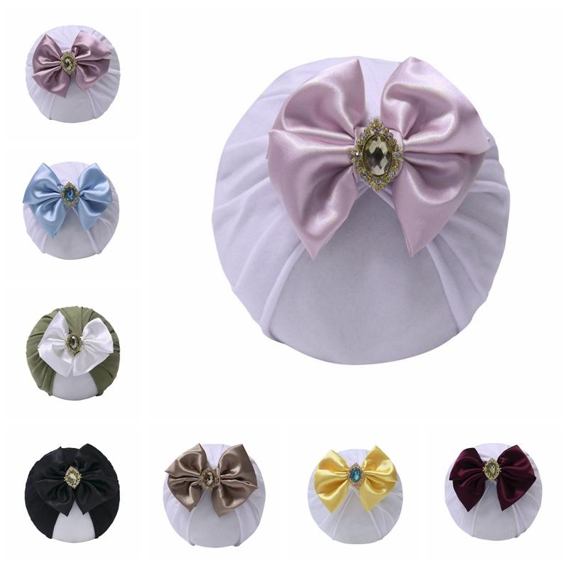 

Beanies Toddler Soft Comfortable Cotton Turban Hat Cute Handmade Bowknot Infant Caps With Rhinestone Baby Girls Headwear Birthday Gifts