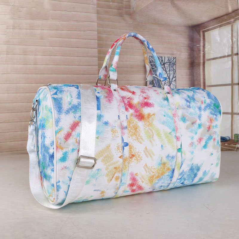 

50CM Camouflage graffiti large capacity duffel bags women men travel bag hotes sale quality shoulder carry on luggage bottom rivets hote handbag