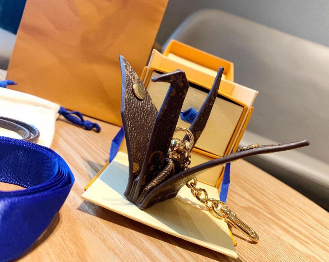 

Compare with similar Items keychain L letter leather designer keychains car fashion ring lanyard cute key wallet chain rope portachiavi with