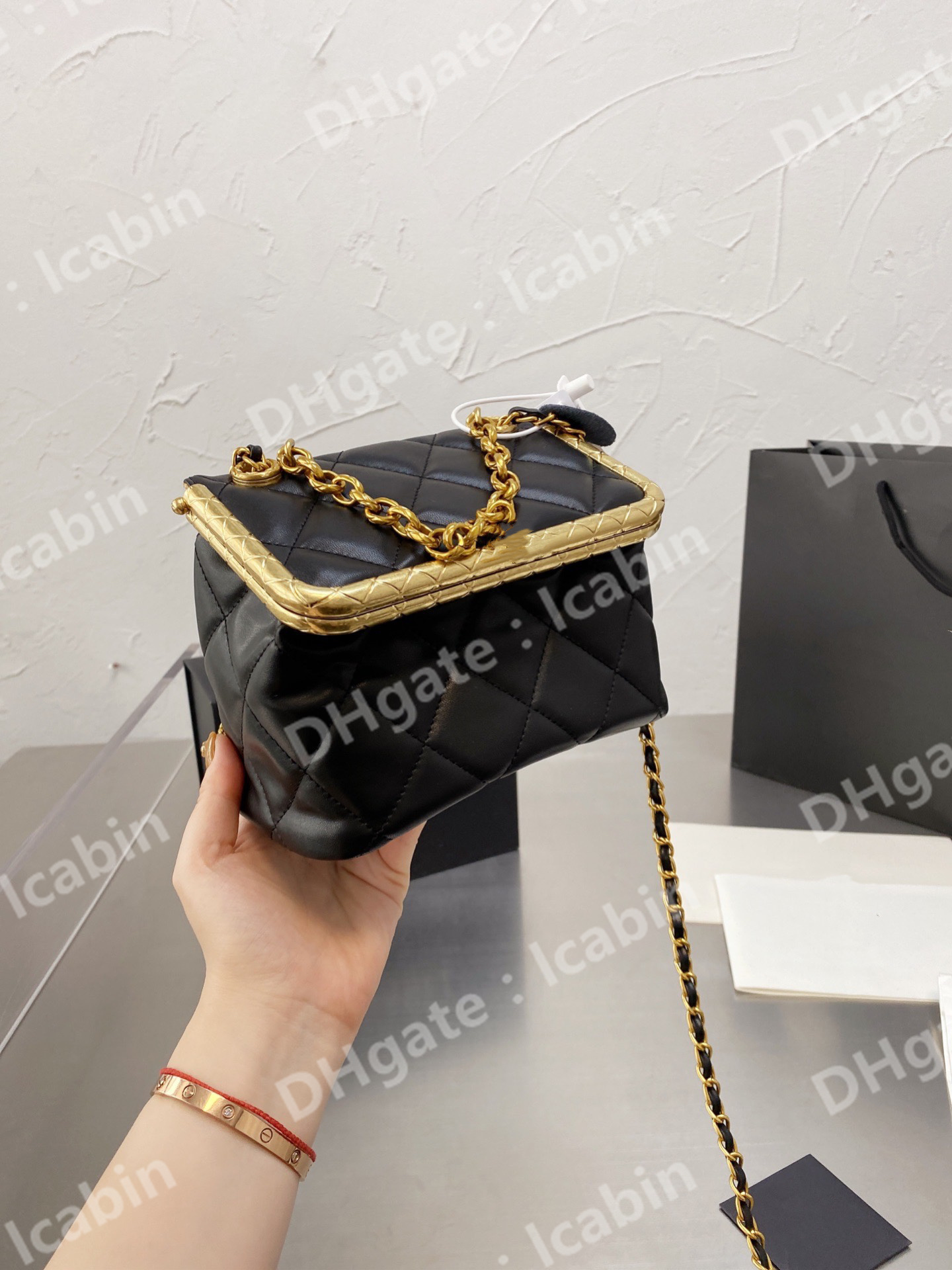 

Women Luxurys Designers Celebrity classic fashion leisure tower buckle bag single shoulder diagonal span 18*13cm high quality checked patter