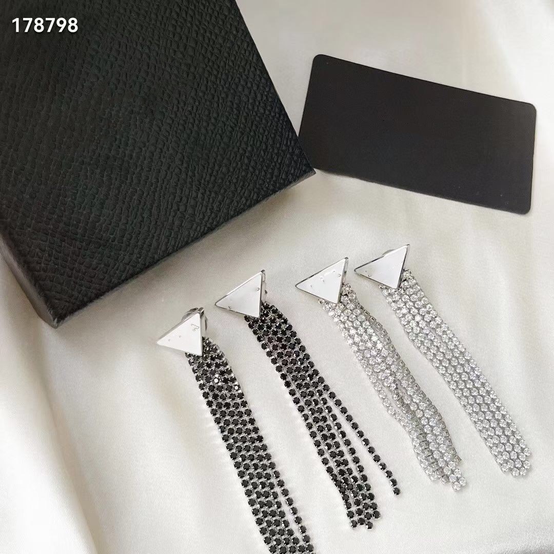 

European and American classic letters Dangle & Chandelier design black white tassel enamel fashion all-match earrings female high quality fast delivery