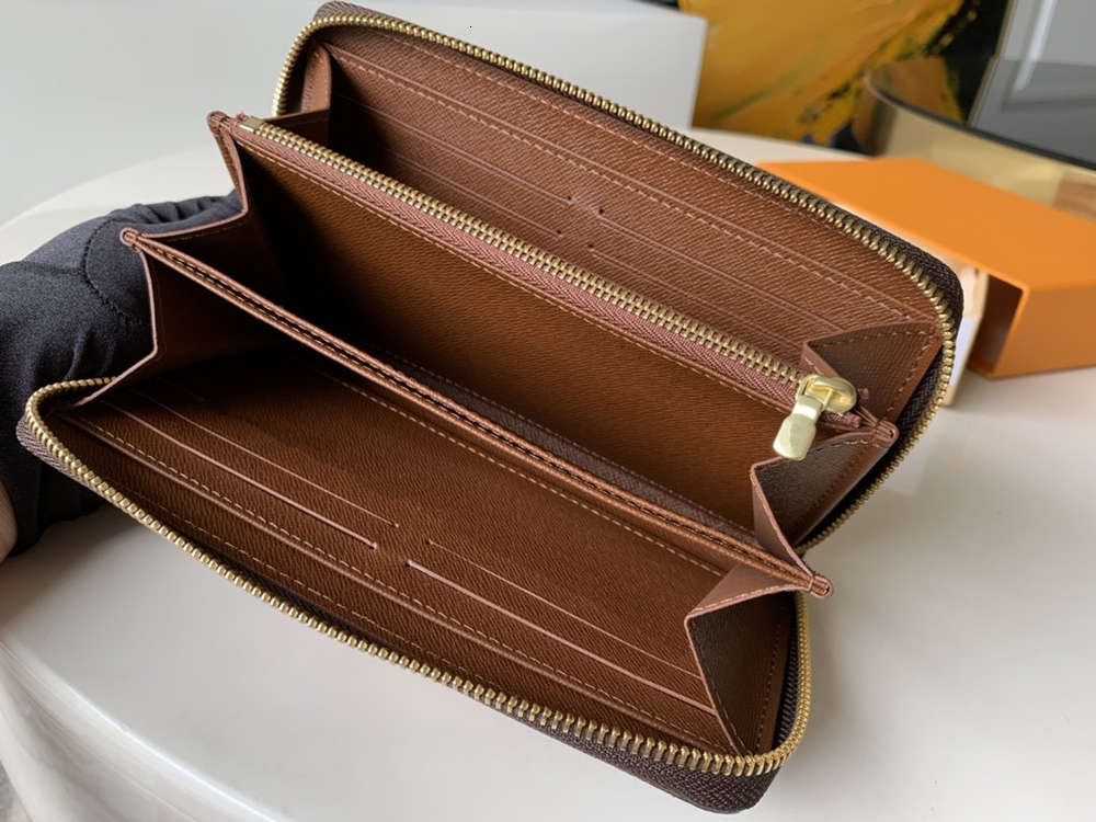

2021Designer2021 FASHION MEN WOMEN luxurys designers wallet bags zipper ZIPPY 60017 M60930 card coin Key Holders purse wallets leather Handb