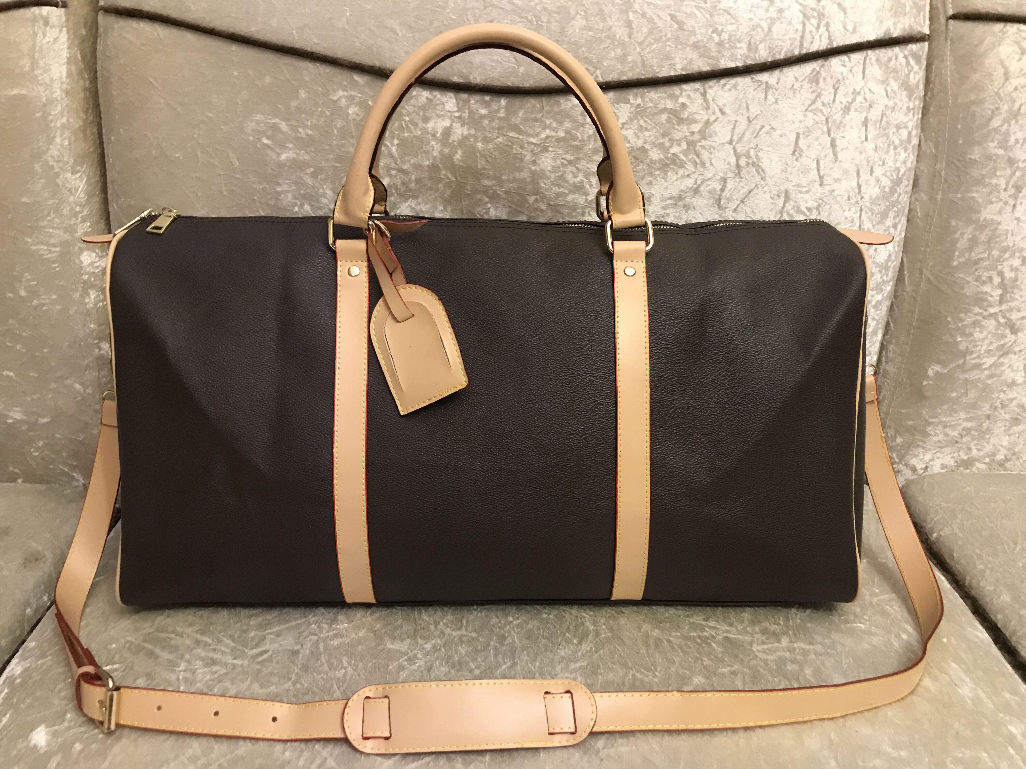 

Duffel Bags 54cm large capacity women travel menbags sale quality Accessories men shoulder duffels womenbags carry on luggage bottom rivets with lock head, No box