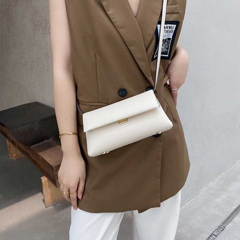 

Temperament niche design 2020 new fashion messenger advanced sense cowhide women's single shoulder small square bag, White