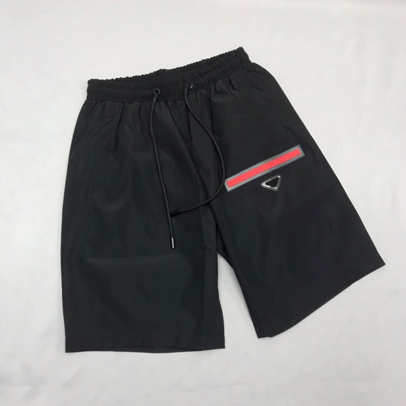 

21ss Fashion Summer Italy Metal Logo Red Silicone Applique Nylon Beach Shorts Women Men High Street Middle Jogging Pants, Black metal logo shorts