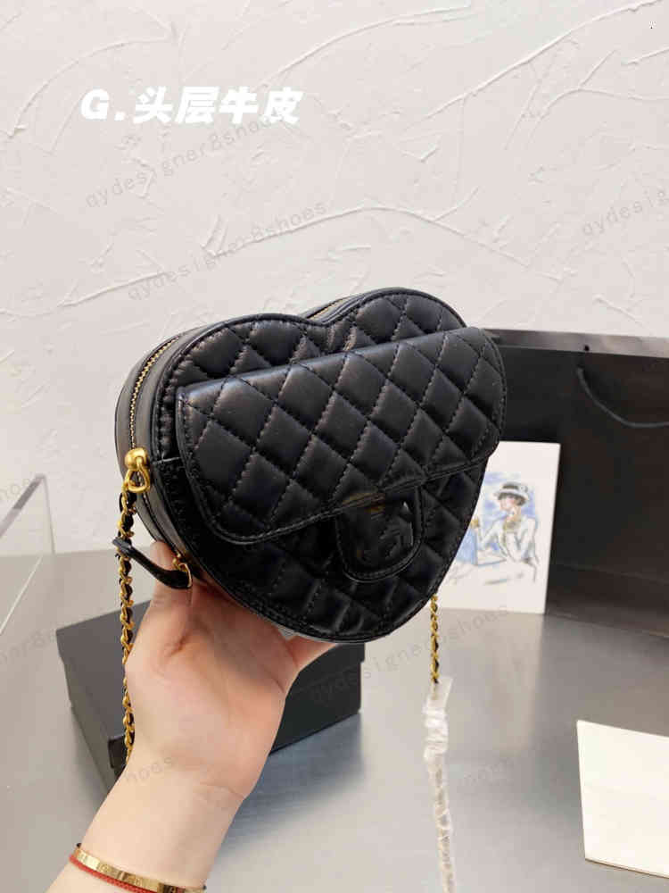 

Designer women's cowhide material black love one-shoulder messenger bag size 19*16cm