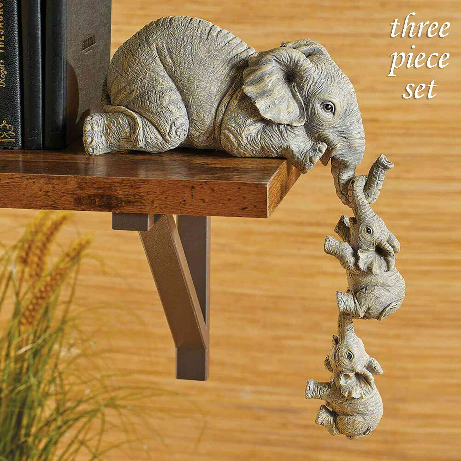 Handpainted pretty elephant nanny figurines home ornament table mom and two babies hanging off the edge of the present shelf of love-image-693907255