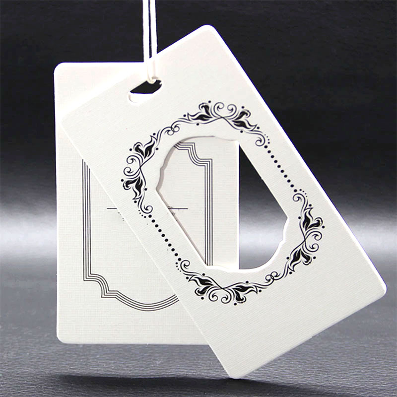 

Sewing Notions Specially plastic tags printing embossed foiled UV Tech customized price hangtag paper tag for jeans clothing and garments