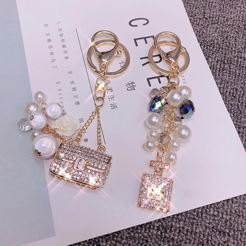 

Keychains Creative Rhinestone Beaded Perfume Bottle Keychain Female Korean Car Exquisite Backpack Fashion Pendant Gift
