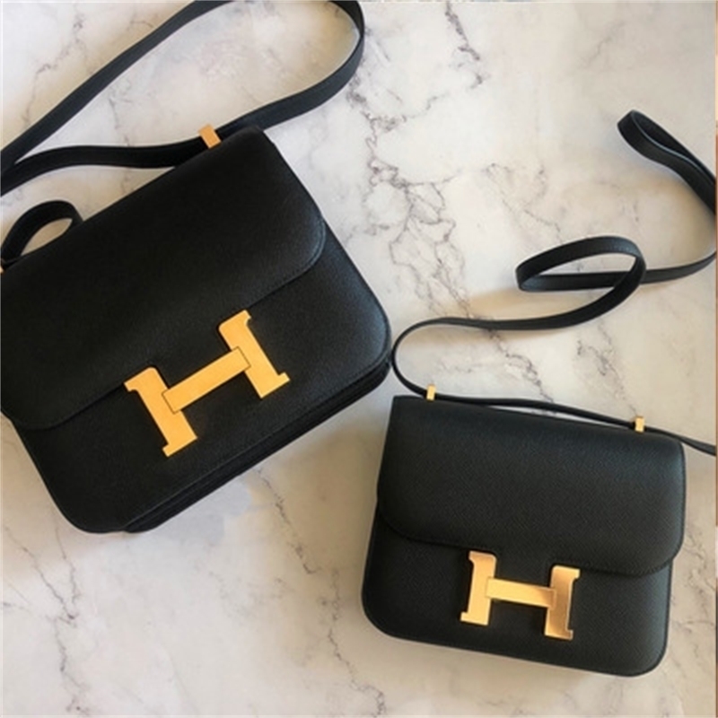 

Outlet 2020 leather women's h-button Kangkang fashion one shoulder slant span small square cow skin box bean curd bag xwl