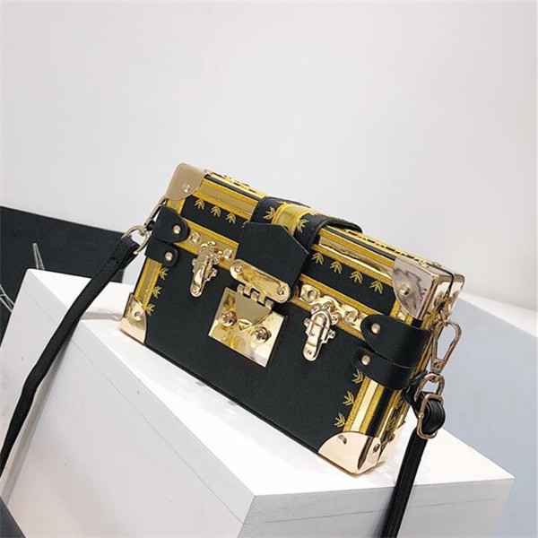 

Factory wholesale women handbag artwork embroidery bags street trend Twist Lock hard box clutch handbags personality Metallic rivet womens messenger bag