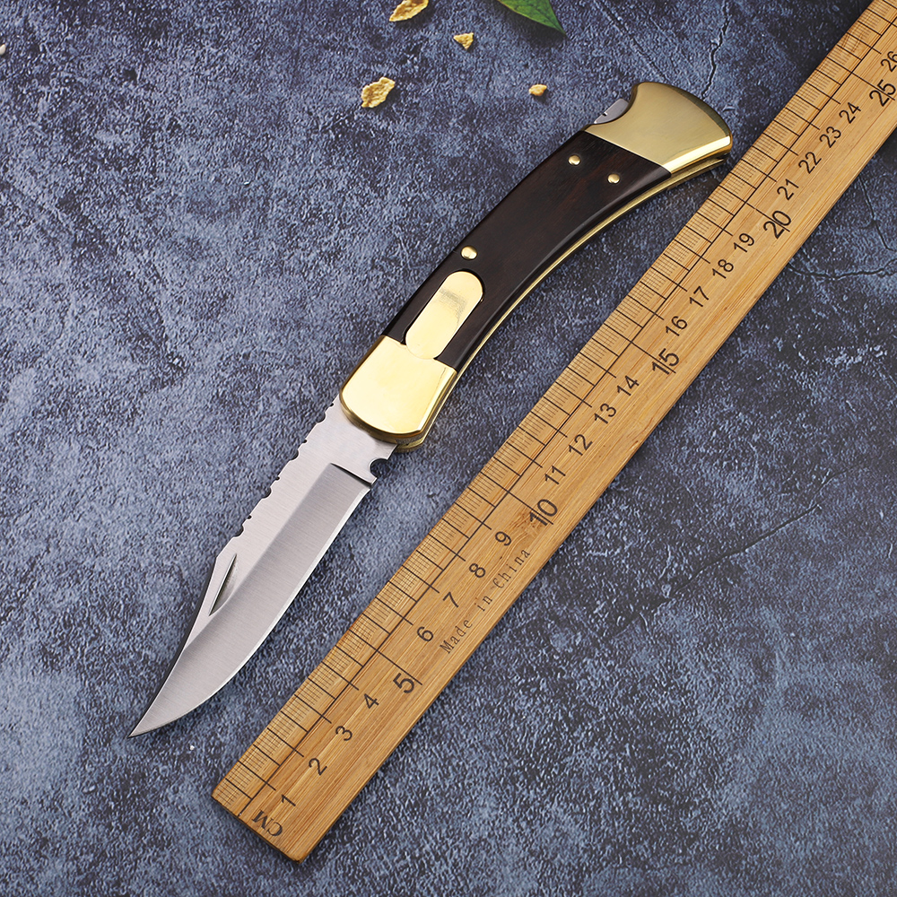 

High-end 110 engraving single action sawtooth brass + wooden handle hunting outdoor camping hunting pocket fruit knife EDC Christmas gift kn