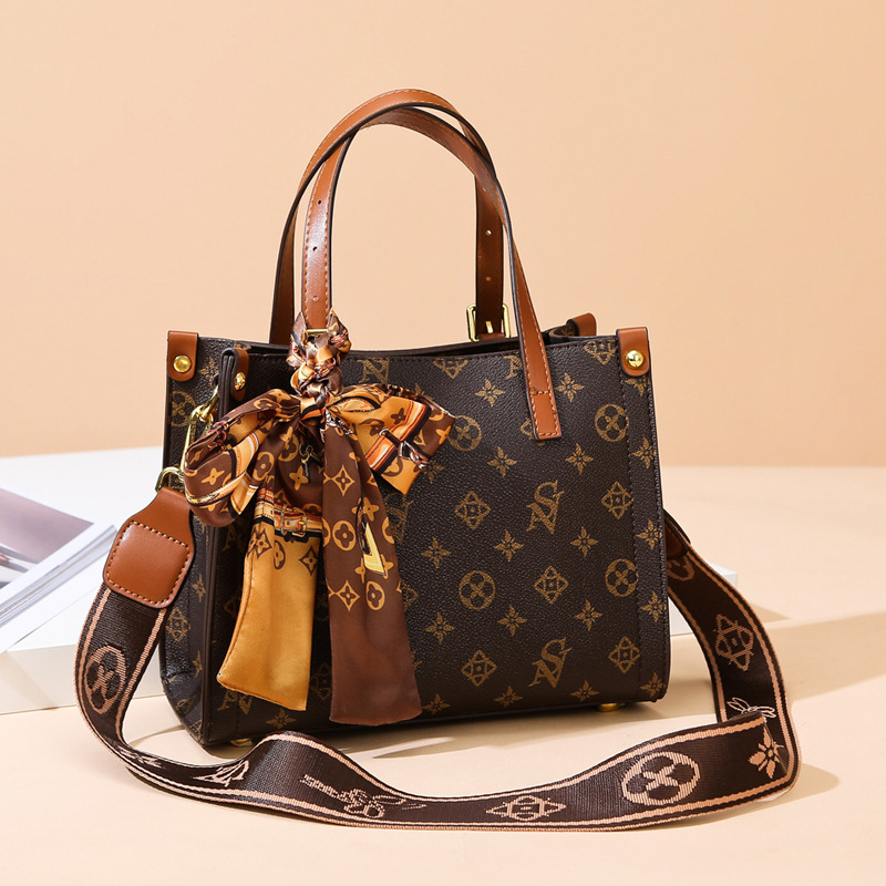 

Wholesale ladies brand shoulder bags Hong Kong style and exotic alphabet handbag elegant ribbon ladies tote bag large capacity double-sided color leather handbags, Brown and coffee-2040
