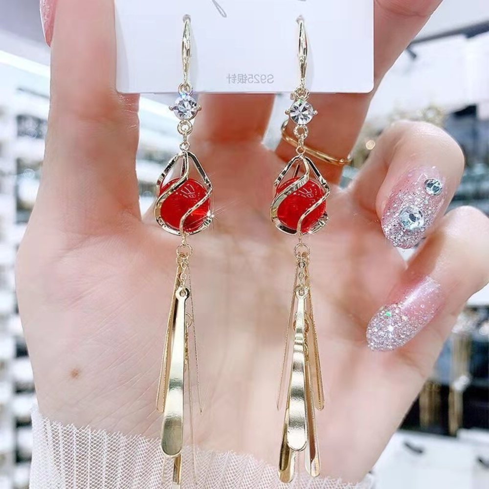 

earrings Korean temperament diamond long cat's eye stone earrings women's net red fashion personality GOLD SEQUIN Earrings, Golden