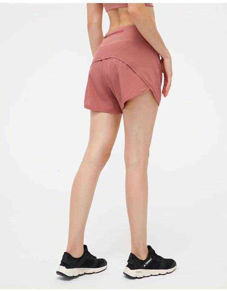 

Womens Shorts speed up mid-rise short 4\, Yellow