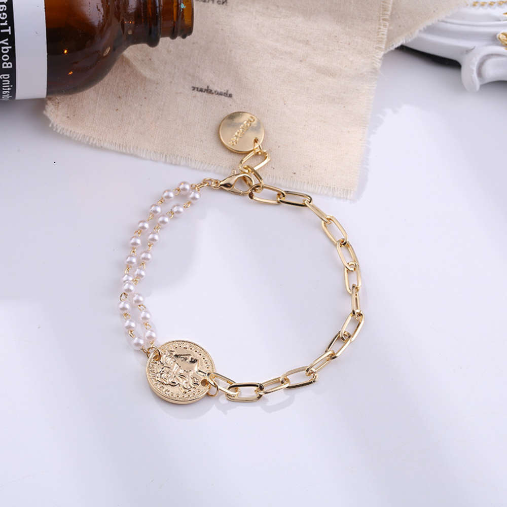 

Hand catenary South Korea simple art design style creative asymmetry cool people's head bracelet pearl jewelry, Golden;silver