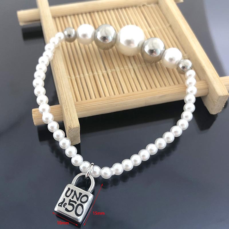 

Stainless Steel Pearl Ball UNOde 50 Lock Lettering Women's Charm Bracelet Jewelry For Gifts Bracelets