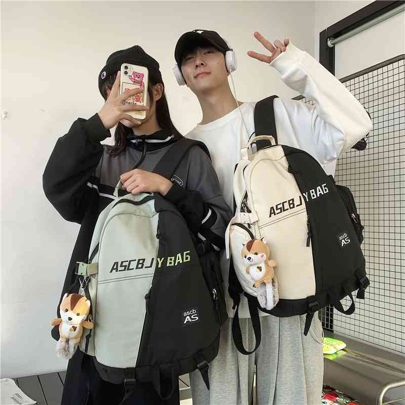 

2021 new spring and summer simple schoolbag female Korean version Harajuku student large capacity backpack male, Blue (without pendant)