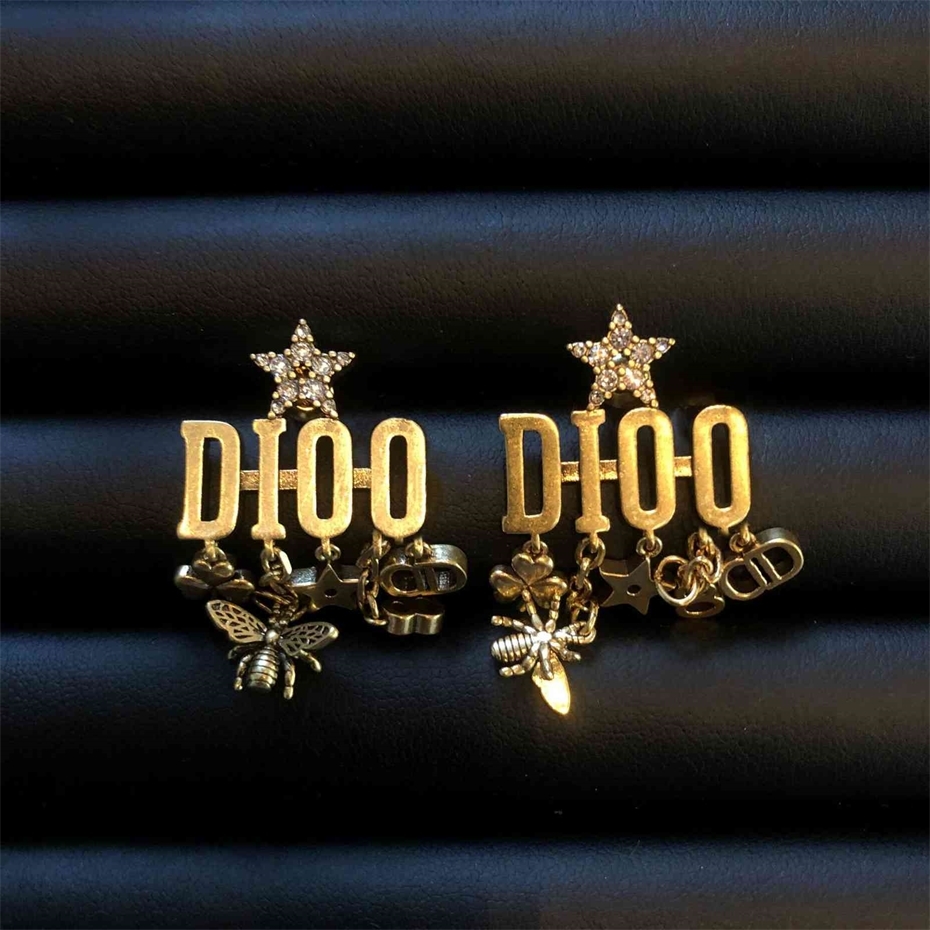 Boucles d'oreilles pompon étoile pour nouvelle broche en épingle à cheveux rouge de 20 ans pour femmes