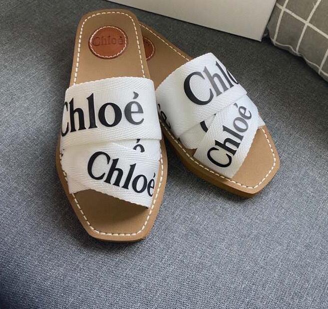 

658 Top Women Woody Mules Slippers Designer Canvas Cross Woven Sandals Summer Outdoor Peep Toe Casual Slipper Letter Stylist Shoes, Black