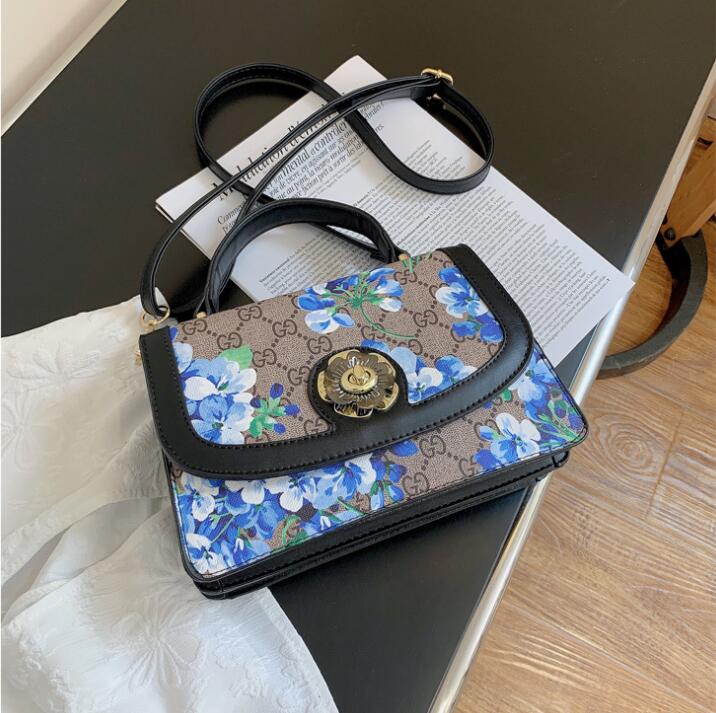 

Factory wholesale women leathers shoulder bags national customs flip printed handbag elegant atmosphere, color matching backpacks fashion leather messenger bag