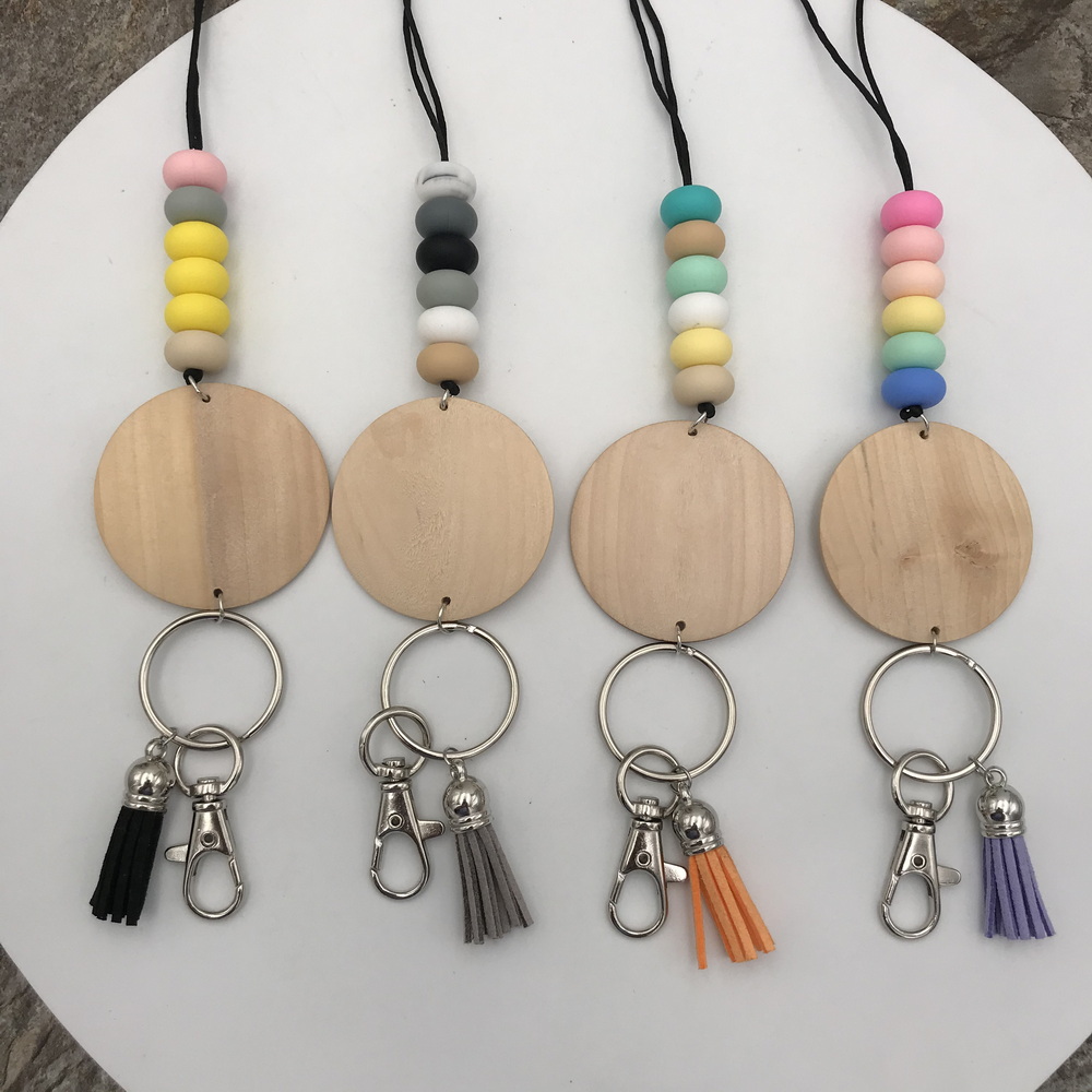

Wholesale New Design Handmade Silicone Beads Pencil Rope Tassel Pendant Personalized Engraved Wood Disc Lanyard Necklace