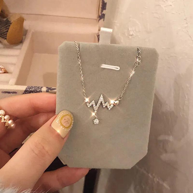 

Pendant Necklaces Fashion Heartbeat Fluctuation Necklace For Women Cubic Zirconia Heart With Silver Color Stainless Steel Clavicle Chain