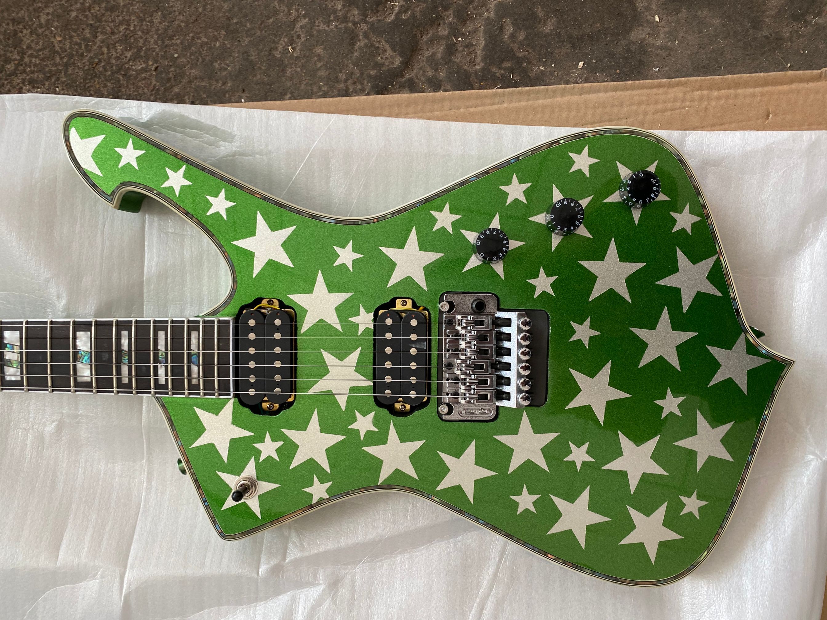 

White Zombie Jay Yuenger ICJ100WZ Iceman Galactic Electric Guitar Metallic Green Silver Star Top, Floyd Rose Tremolo Bridge, Pearl & Abalone Block Inlay