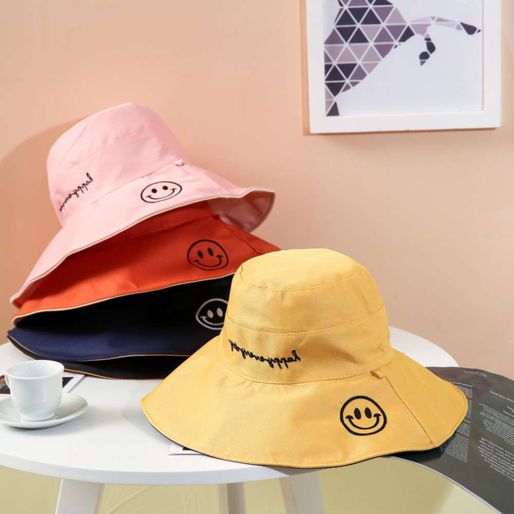 

female spring and summer big eaves sunscreen smiling face fisherman's Korean red tide children's age reduction double sided sun Hat, Yellow