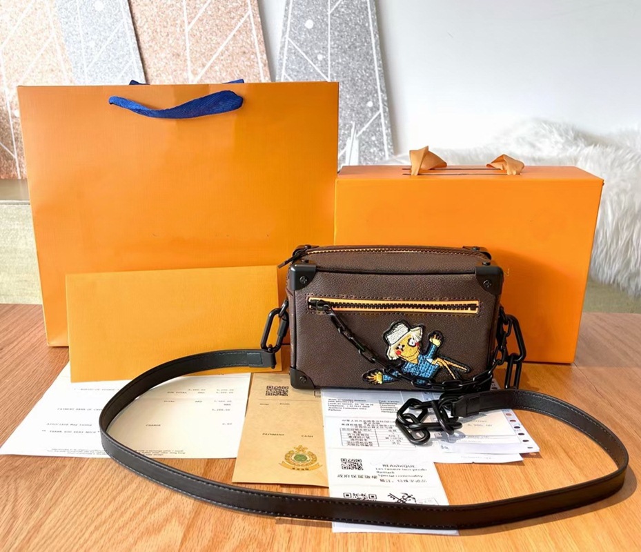 

Top Leather Mini Soft Trunk Scarecrow Designers Luxurys Shoulder Bags Old Flower Men's/Women's Fashion Chain Crossbody Messenger B